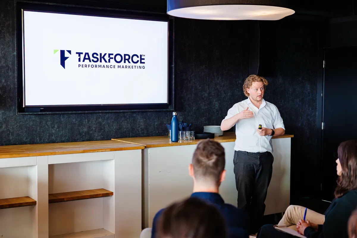 Taskforce team having a conversation over coffee